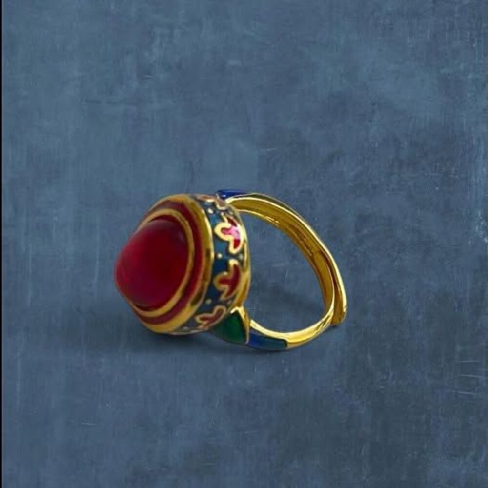 whimsical vintage style chunky red stone ring with blue and gold details, adjust